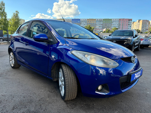 Фото mazda 2 3